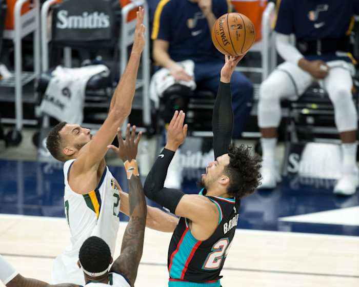 Rudy Gobert (27) blocks a shot by Dillon Brooks (24)